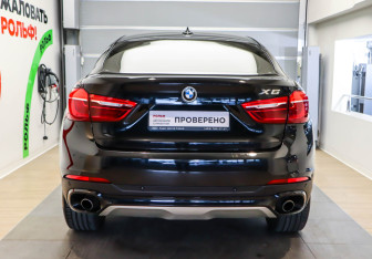 Подержанный автомобиль BMW X6 2016 года (4 фото)