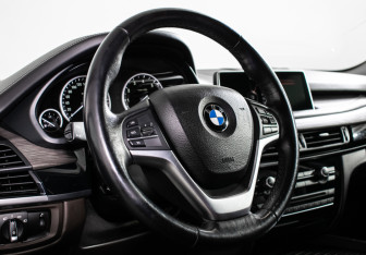 Подержанный автомобиль BMW X5 2014 года (13 фото)