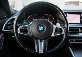 Подержанный автомобиль BMW X6 2020 года (21 фото)