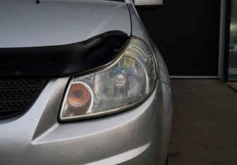 Подержанный автомобиль Suzuki SX4 Sedan 2010 года (18 фото)