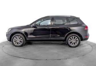 Подержанный автомобиль Volkswagen Touareg 2012 года (8 фото)