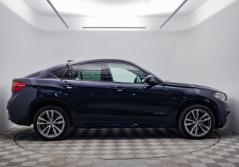 Подержанный автомобиль BMW X6 2018 года (6 фото)