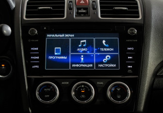 Подержанный автомобиль Subaru XV 2015 года (12 фото)