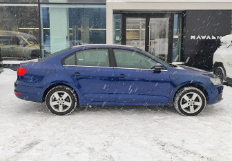 Подержанный автомобиль Volkswagen Jetta Sedan 2013 года (4 фото)