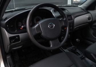 Подержанный автомобиль Nissan Almera Classic 2008 года (13 фото)