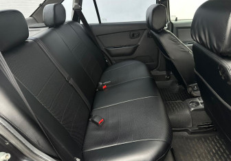 Подержанный автомобиль Daewoo Nexia Sedan 2012 года (14 фото)