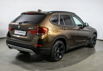 Подержанный автомобиль BMW X1 2014 года (5 фото)