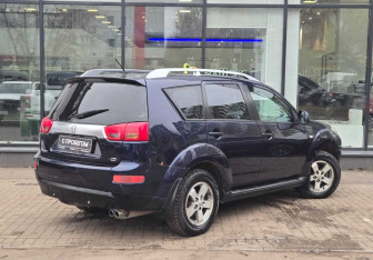 Подержанный автомобиль Peugeot 4007 2009 года (8 фото)