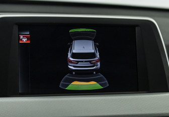 Подержанный автомобиль BMW X1 2015 года (17 фото)