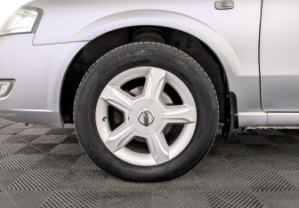 Подержанный автомобиль Nissan Almera Classic 2009 года (18 фото)