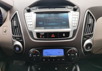 Подержанный автомобиль Hyundai ix35 2010 года (13 фото)