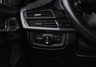 Подержанный автомобиль BMW X6 2014 года (11 фото)