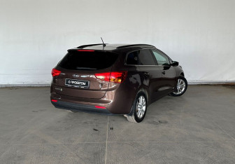 Подержанный автомобиль Kia Ceed Wagon 2014 года (6 фото)