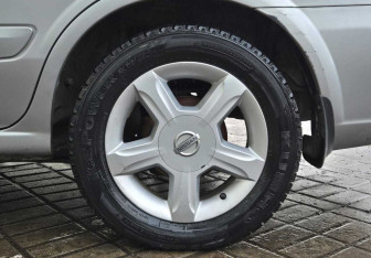 Подержанный автомобиль Nissan Almera Classic 2008 года (13 фото)