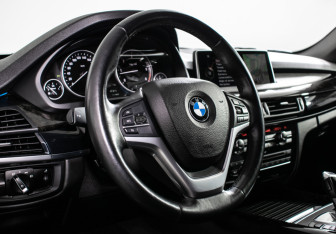 Подержанный автомобиль BMW X5 2016 года (13 фото)