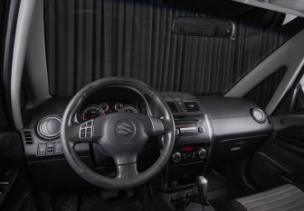 Подержанный автомобиль Suzuki SX4 Hatchback 2011 года (8 фото)