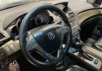 Подержанный автомобиль Acura MDX 2009 года (15 фото)