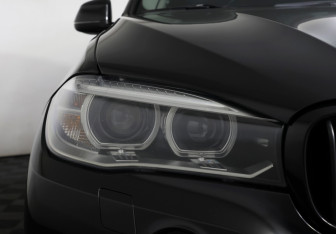 Подержанный автомобиль BMW X5 2014 года (22 фото)