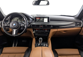 Подержанный автомобиль BMW X6 2018 года (14 фото)