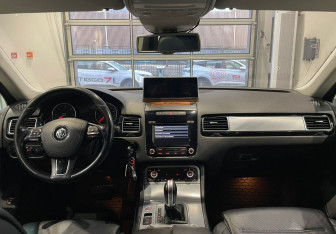 Подержанный автомобиль Volkswagen Touareg 2014 года (11 фото)