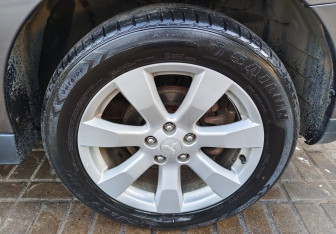 Подержанный автомобиль Mitsubishi Outlander 2011 года (14 фото)