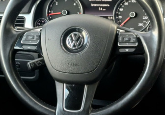 Подержанный автомобиль Volkswagen Touareg 2011 года (13 фото)