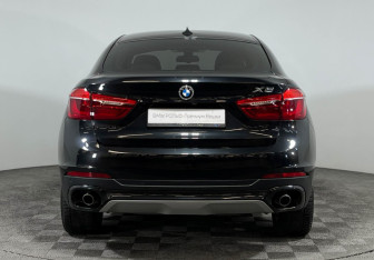 Подержанный автомобиль BMW X6 2015 года (4 фото)