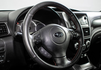 Подержанный автомобиль Subaru Impreza WRX Sedan 2012 года (13 фото)