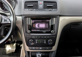 Подержанный автомобиль Skoda Yeti 2015 года (15 фото)