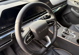 Подержанный автомобиль Omoda C5 2024 года (14 фото)