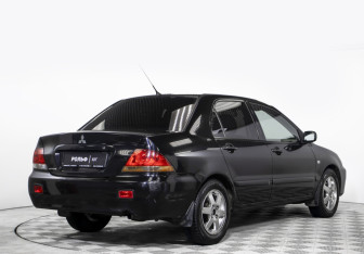 Подержанный автомобиль Mitsubishi Lancer Sedan 2007 года (5 фото)