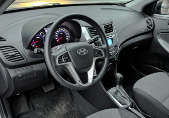 Подержанный автомобиль Hyundai Solaris Hatchback 2013 года (15 фото)