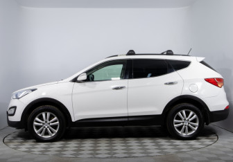 Подержанный автомобиль Hyundai Santa Fe 2014 года (8 фото)