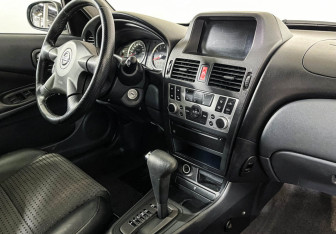 Подержанный автомобиль Nissan Almera Hatchback 2006 года (9 фото)