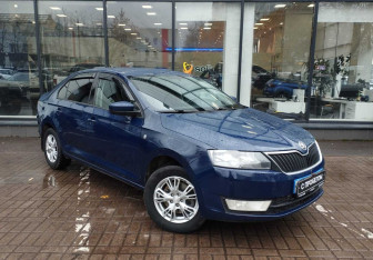 Подержанный автомобиль Skoda Rapid Liftback 2014 года (3 фото)