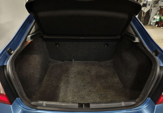 Подержанный автомобиль Skoda Rapid Liftback 2014 года (13 фото)