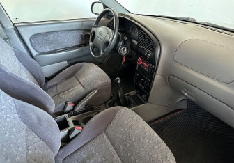 Подержанный автомобиль Kia Spectra Sedan 2006 года (11 фото)