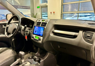 Подержанный автомобиль Kia Sportage 2008 года (13 фото)