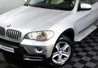 Подержанный автомобиль BMW X5 2009 года (24 фото)