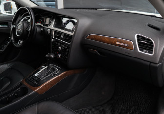 Подержанный автомобиль Audi A4 Sedan 2014 года (7 фото)