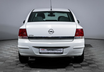 Подержанный автомобиль Opel Astra Sedan 2011 года (6 фото)