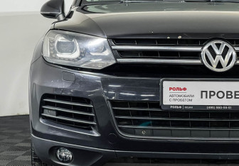 Подержанный автомобиль Volkswagen Touareg 2011 года (14 фото)