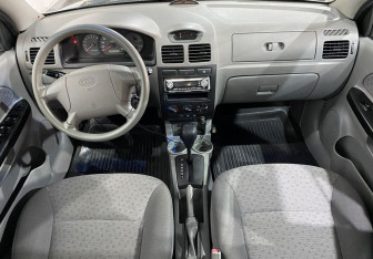 Подержанный автомобиль Kia Rio Sedan 2010 года (9 фото)