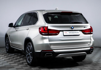 Подержанный автомобиль BMW X5 2015 года (7 фото)