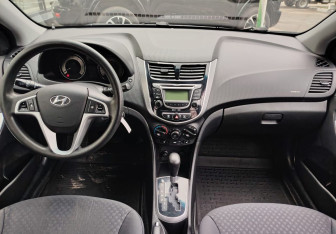 Подержанный автомобиль Hyundai Solaris Hatchback 2013 года (9 фото)