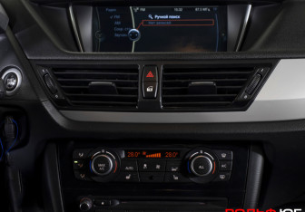 Подержанный автомобиль BMW X1 2014 года (14 фото)