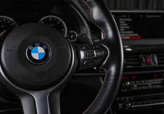 Подержанный автомобиль BMW X6 2014 года (13 фото)