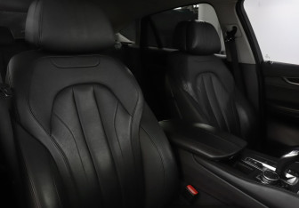 Подержанный автомобиль BMW X6 2016 года (18 фото)