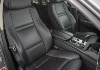 Подержанный автомобиль BMW X6 2013 года (10 фото)