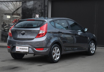 Подержанный автомобиль Hyundai Solaris Hatchback 2011 года (5 фото)